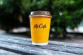 Yellow glass of coffee from McDonald\'s