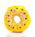 A yellow glazed donut Royalty Free Stock Photo