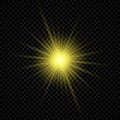 Yellow glowing lights starburst effects with sparkles Royalty Free Stock Photo