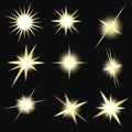 Yellow glowing lights stars. A flash of sun with rays and spotlight. Royalty Free Stock Photo