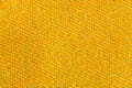 Yellow gold canvas fabric texture background. Textile and decoration concept. Wallpaper and interior design Royalty Free Stock Photo