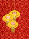 Yellow golden lanterns with red pattern on red background Royalty Free Stock Photo