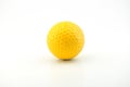 A yellow golf ball