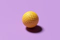 Yellow golf ball on purple background. Abstract art for sports advertising. 3d rendering