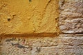 Yellow graffiti wall brick background, in Venice, Italy Royalty Free Stock Photo