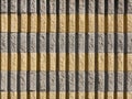 Yellow and gray bricks wall Royalty Free Stock Photo