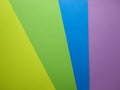 Yellow, green, blue and pink cardboard paper sheets