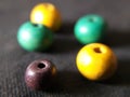 yellow green brown wood beads Royalty Free Stock Photo