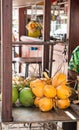 Yellow and Green Coconuts in a Market Royalty Free Stock Photo