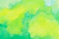 Yellow and green colored ink wash background.