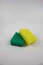 Yellow and green dishwashing sponges