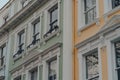 Yellow and green pastel terraced houses in Primrose Hill, North London, UK