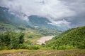 The yellow and green rice terraces above the valley in the green mountains, Asia, Vietnam, Tonkin, Sapa, towards Lao Cai, in Royalty Free Stock Photo