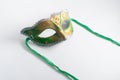 yellow and green Venetian mask on white background Royalty Free Stock Photo