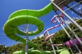 Yellow and green water slide in aquapark Royalty Free Stock Photo
