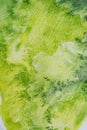 Yellow-green watercolor background. Abstract natural spots