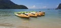 Yellow-green-white paddle boats / kayaks at a sand beach on Phi Phi Island, Thailand Royalty Free Stock Photo