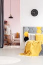 Yellow and grey bedroom interior Royalty Free Stock Photo