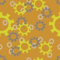 yellow and grey gears on a brown background