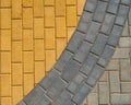 Yellow and grey paving tiles for background or texture Royalty Free Stock Photo