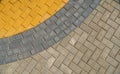 Yellow and grey paving tiles for background or texture Royalty Free Stock Photo