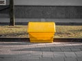 A yellow grit salt box on the street. Royalty Free Stock Photo