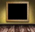 Yellow grunge room with picture frame Royalty Free Stock Photo