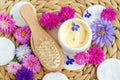 Yellow hair mask banana face cream, shea butter mask, mango body butter in a small white jar and wooden hair brush. Natural spa Royalty Free Stock Photo