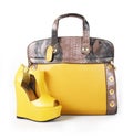 Yellow handbag and wedge shoe Royalty Free Stock Photo