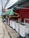 Outdoor laundry waiting clients.