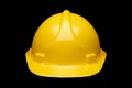 YELLOW HARD HAT ON BLACK BACKGROUND