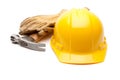 Yellow Hard Hat, Gloves and Hammer on White Royalty Free Stock Photo