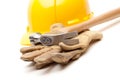 Yellow Hard Hat, Gloves and Hammer on White Royalty Free Stock Photo