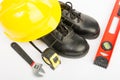 Yellow hard hat and tools Royalty Free Stock Photo