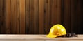 Yellow hard hat on wooden background with copy space. Construction concept. Banner 2:1 Royalty Free Stock Photo