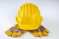 Yellow Hard Hat And Work Gloves Royalty Free Stock Photo