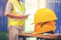 Yellow hard safety helmet hats for safety project of workman as Royalty Free Stock Photo