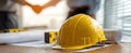 The yellow hardhat on blueprints symbolizing a successful construction agreement. AI generated image Royalty Free Stock Photo