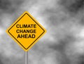 Yellow hazard road sign with Climate Change Ahead message. Bord isolated on a grey sky background. Vector illustration. Royalty Free Stock Photo