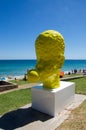 Yellow Head Sculpture: Blowing Bubble