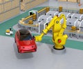 Yellow heavyweight robotic arm carrying red SUV in the assembly factory Royalty Free Stock Photo