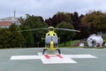 Yellow helicopter on helipad Royalty Free Stock Photo