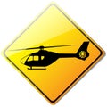 Yellow helicopter or helipad sign