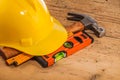 Yellow helmet and wood mounting tools Royalty Free Stock Photo