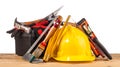 Yellow helmet and wood mounting tools Royalty Free Stock Photo