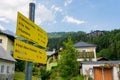 Yellow hiking table showing the way for hiking Austria alps.