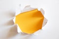 Yellow hole in paper Royalty Free Stock Photo