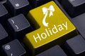 Yellow holiday button on the keyboard Royalty Free Stock Photo