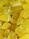 yellow homemade hard candy as background, pastry, copy space, greeting card, postcard, banner, cover, mockup, for your