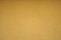 Yellow homogen wall texture and background Royalty Free Stock Photo